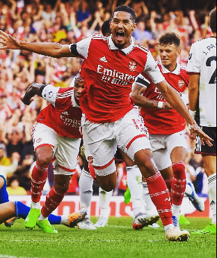 William Saliba and other teammates in the background Arsenal’s Resilient Drive: Breaking the Cycle of Near Misses with Unyielding Determination